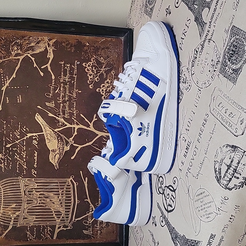 ADIDAS WHITE WITH BLUE. YOUTH SIZE 5 1/2 EQUALS WOMANS SIZE 7